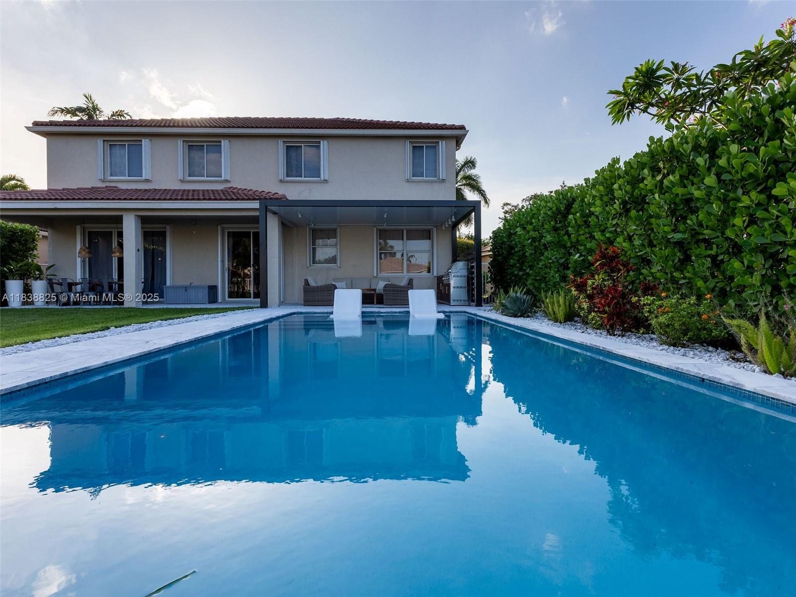 Gorgeous WATERFRONT 2 story home in sought after Savanna, with a POOL! This home has 4 BEDROOMS PLUS OFFICE, and 2.5 BATHS, and the most Stunning Backyard with SALT WATER POOL, extra large covered patio with SUMMER KITCHEN, perfect for family gatherings and entertaining! Home is immaculate with neutral porcelain tile downstairs and wood flooring upstairs. Big open kitchen with granite tops, stainless steel appl and white cabinets. Accordion hurricane shutters, 2 AC units and electric car power connection. Located in a nice cul-de-sac and zoned for A Schools, Gator Run Elem, Falcon Cove Middle and Cypress Bay High. Resort style amenities including pools, basketball ct, soccer field, pickleball, coffee store and more. Landscaping and pool maintenance included in rent. Won't last!