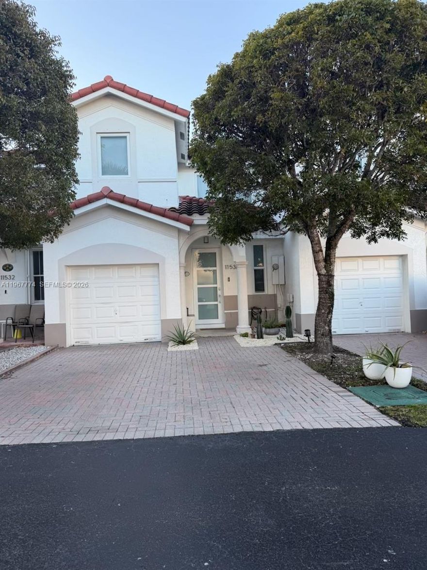 Unit located on a gates community-Sandcastle at Doral, fully renovated with new modern kitchen,floors,impact windows,all bedroom doors,master custom closets. New roof replacement on 2021 . tile floor,full kitchen with island,central A/C and heating. Front load washer and dryer with cabinets, pet friendly