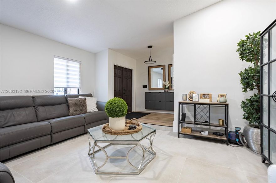 Stunning, fully remodeled modern home with more than 200k in upgrades in the highly sought-after Jacaranda Lakes community! This beautifully updated residence on an oversized lot in the center of a cul-de-sac, showcases sleek finishes and thoughtful design throughout with brand new flooring and fresh paint. Fully equipped with a gourmet kitchen and updated bathrooms. Enjoy peace of mind with MAJOR upgrades including impact windows and doors all throughout (2022), roof (replaced in 2022), two A/C units (2024), a tankless water heater (2022), and a new pool pump (2026). Located in a prime area and zoned for desirable Central Park Elementary, this property combines luxury, comfort, and convenience. A true move-in ready gem!