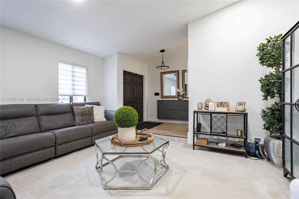 Photo of 1030 NW 95th Ter, Plantation, FL 33322 (MLS # A12002132)