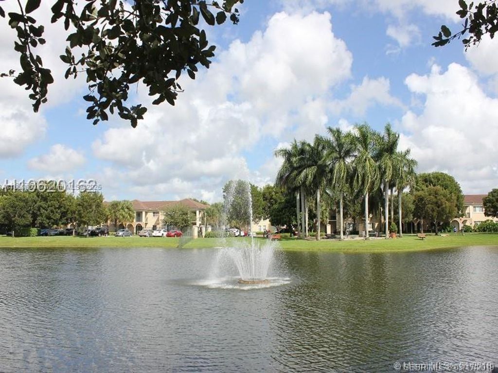 Photo of 2520 Centergate Dr #303, Miramar, FL 33025 (MLS # A11850350)