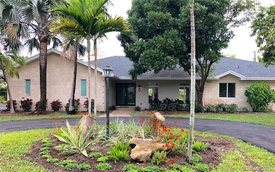 An absolute gem!  Completely remodeled to the latest, modern standards. Pictures don't do it justice.
This 4 bedroom/3.5 bath family home, with new coral rock facade, is located at the end of a quiet cul du sac street in the heart of Pinecrest; near all Palmetto schools.  It features a sleek, euro-design kitchen with open floor plan to dining area, pool deck and family room.  Marco Corona Italian porcelain floors cover the entire home; new appliances and AC; Italian marble and tile, European vanities and Hansgrohe faucets; designer light fixtures; new impact doors and windows.  All new plumbing - 100% PVC lines.  Brand new roof (2018) and newly paved circular driveway.  For the buyer who wants the latest design in living space. Best available property in Pinecrest in its price range.
