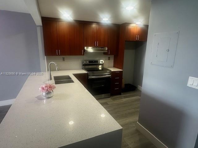 "Fully remodeled unit ready for immediate move-in! Features include a brand-new washer and dryer, new range, updated kitchen with quartz countertops and modern cabinetry. Enjoy peace of mind with impact windows, hurricane shutters, and a new roof. Community amenities include a pool, tennis courts, and a basketball court."
