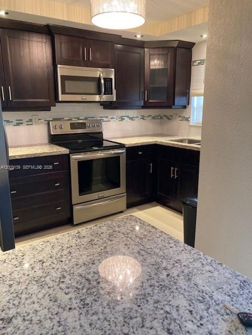 Photo of 361 S Hollybrook Dr #205, Pembroke Pines, FL 33025 (MLS # A12009139)