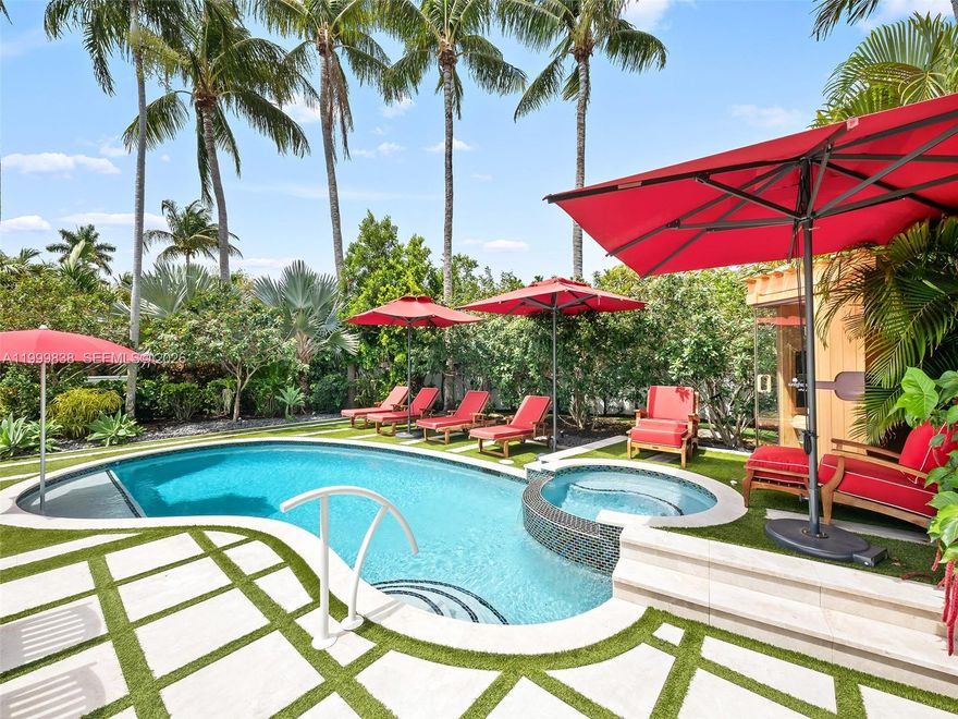 Welcome to resort style living in the heart of Coral Ridge.This completely remodeled 4 bedroom, 3 bath home sits on an expansive 15,000+ sq ft lot within the coveted Bayview School District, just minutes from Fort Lauderdale Beach, premier dining & shopping.This home is move in ready with all major updates completed, including a newer flat tile roof (22'),2 zone A/C,full impact windows and doors, natural gas, whole home generator & whole home water filtration system, offering peace of mind with no major mechanical upgrades needed. Inside, you will find a bright and expansive living space with all wood flooring throughout and large picture windows that fill the home with natural light. The chef’s kitchen is designed for both everyday living and entertaining, featuring high end finishes, generous prep space, and seamless flow into the main living areas.The spacious primary suite offers a true retreat with a spa like en suite bath designed for relaxation.Step outside to your private outdoor oasis where meticulous landscaping surrounds a resort inspired setting complete with a sauna, whirlpool, outdoor shower, and multiple areas to relax or entertain. The fully walled property & fenced yard provides exceptional privacy, creating a serene and lush tropical escape, while the marble paver driveway enhances the home’s curb appeal.Every detail has been thoughtfully curated to deliver the ultimate South Florida lifestyle, combining comfort, design, and effortless indoor outdoor living.