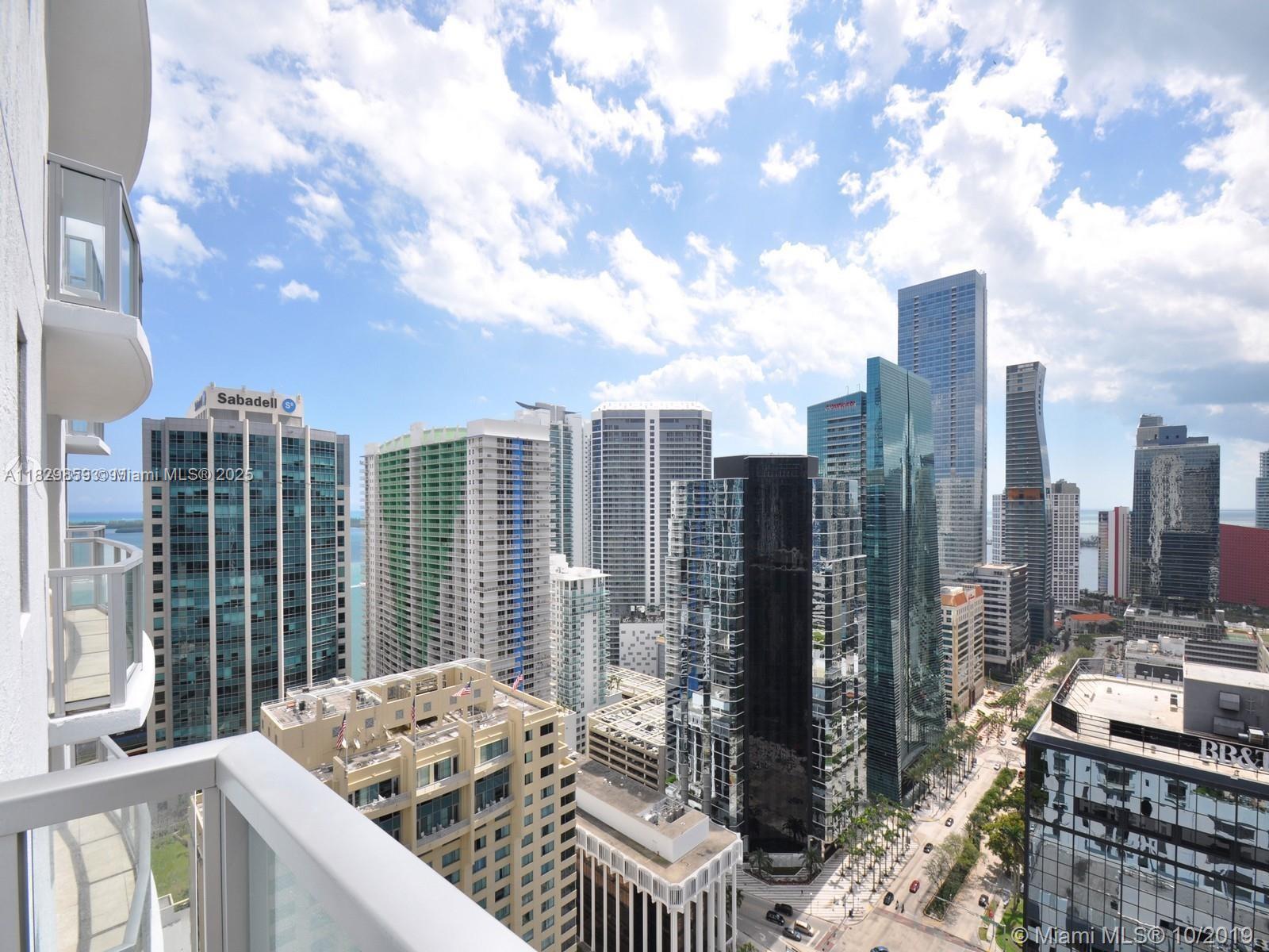 Beautiful 2 bedrooms + 2 baths corner unit with marble floors throughout & roller shades. Modern open-kitchen layout with wood cabinetry, black granite countertops and SS appliances. Building offers: fitness center, swimming pool, 24-hour concierge & valet, wine & cigar lounge, virtual golf and spa treatment room. Comes with 1 parking space assigned