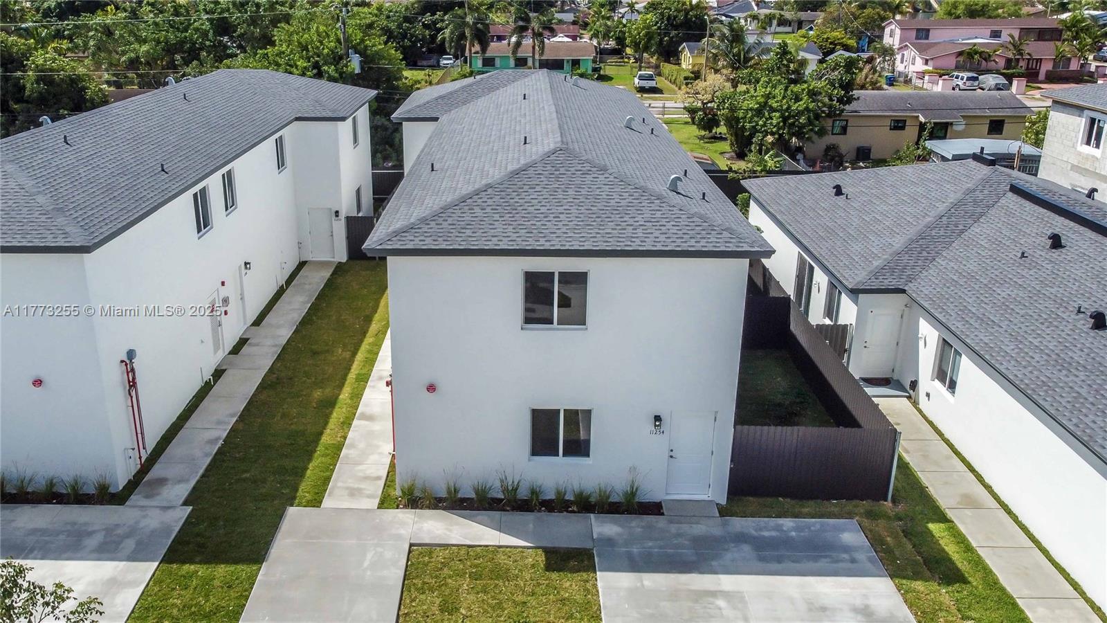 Come find the newly built Gabriela Estates located near Cutler Bay with easy access to the Florida Turnpike and US-1. 11254 SW 187th Street is a new construction triplex that consists of 100% 3, 3-Bed/2.5-Bath units. Each unit comes with 2 parking spaces. Modern kitchens with quartz countertops and stainless steel appliances. Every unit has a washer/dryer, central air, fire sprinkler system for safety, and a private yard. Every unit is individually metered for water. Tile floors throughout the first level and luxury vinyl plank floors throughout the stairs and second levels. NO HOA fees or CDD fees. There are 4 other triplexes also for sale by the same developer.