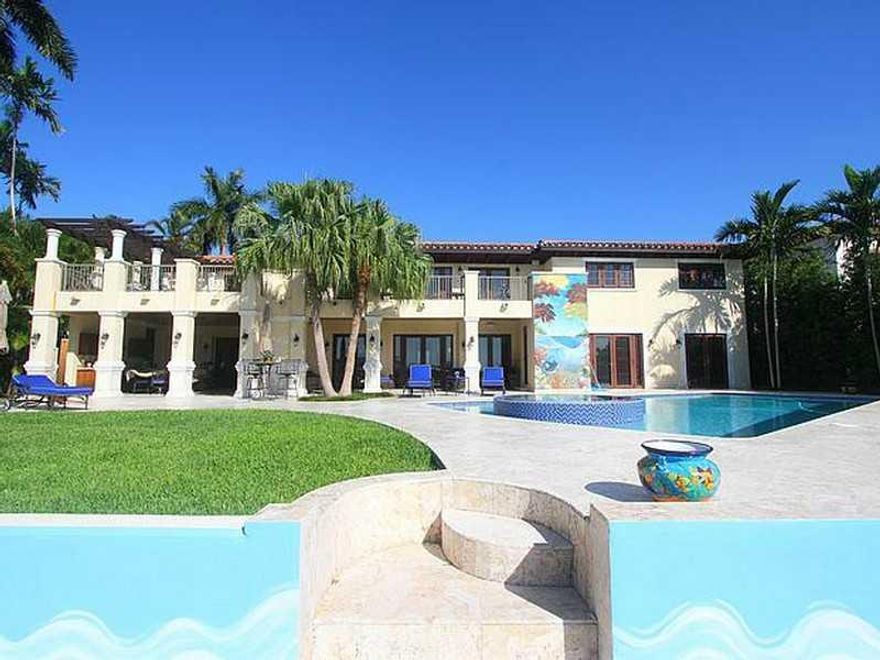 Stunning renovation of a classic Pancoast estate on prestigious upper N Bay Road!  Boasting 104+/- ft of waterfront with fantastic wide-bay views, this estate is simply breathtaking.  Everything is state of the art and new.  Exquisite stone, marble, and w ood used throughout.  Living, dining, and family rooms all have views of the open bay.  Custom bar in media/game room.  Stately master with oversized bath.  Heated pool w/built-in spa.  Custom dock w/boatlift.