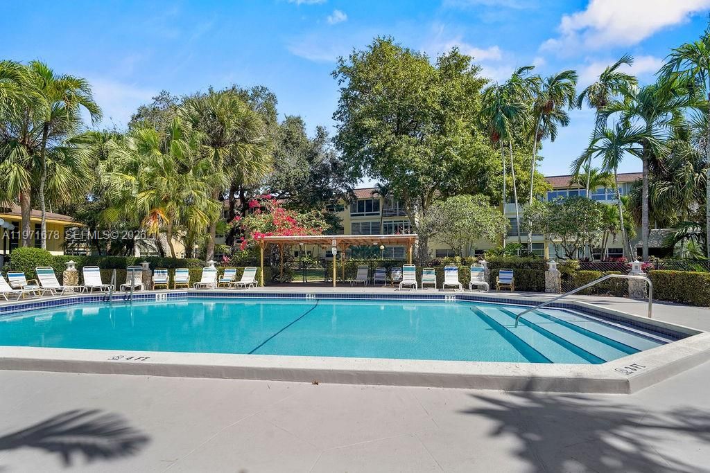 Photo of 5121 W Oakland Park Blvd #109, Lauderdale Lakes, FL 33313 (MLS # A11971678)