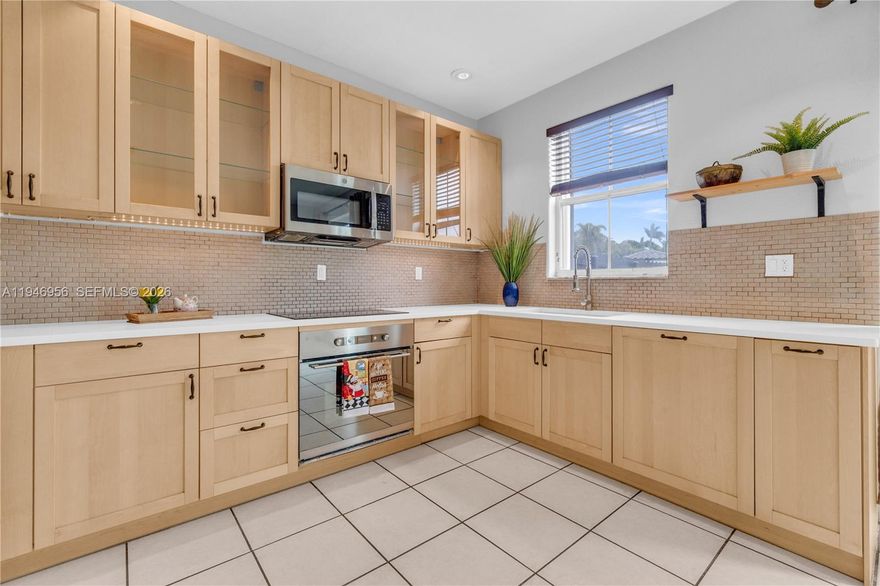 ** BEST PRICED 3/3 TOWNHOME in Doral with low HOA ** Located in a prime area of Doral, this 3-bedroom, 3-full bathroom townhome offers convenience and comfort. One bedroom and a full bathroom are conveniently situated on the first floor. Each bedroom has its own private bathroom. Corner unit. Accordion shutters. One of the lowest HOAs in Doral, covers the roof, exterior, and common areas. This gated community is both secure and well-maintained. Exteriors have been recently painted and roof replaced about two years ago. HOA has reserves. Owners can park up to 3 cars. Close to supermarkets, restaurants, and major expressways for quick and easy access. Schedule a showing today.