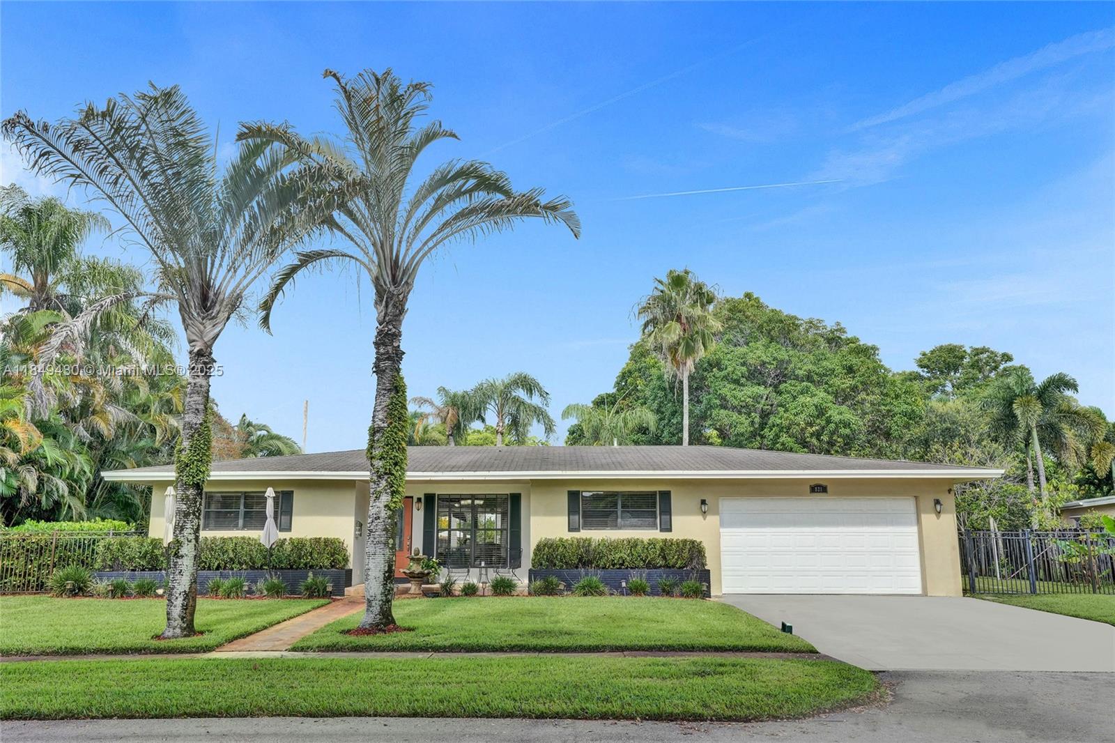 Welcome to your personal paradise! This light & bright home offers the perfect blend of indoor comfort and outdoor serenity. Nestled on a lush 1/3-acre lot, mature fruit trees offering shade, large covered patio perfect for entertaining and a sparkling pool with cascading waterfall and outdoor shower. Open living area bathed in natural light, spacious galley kitchen with rich wood cabinetry and ample counter space. 3 bedrooms plus extra room, ideal as a laundry room, office, playroom or easily converted to a 4th bedroom, well-maintained with classic finishes. Don’t miss your opportunity to own this home with a rare blend of charm, functionality and tropical tranquility. Pre-approved buyers only please, offers on AS-IS Contract, 7-day inspection period, 15-day loan approval