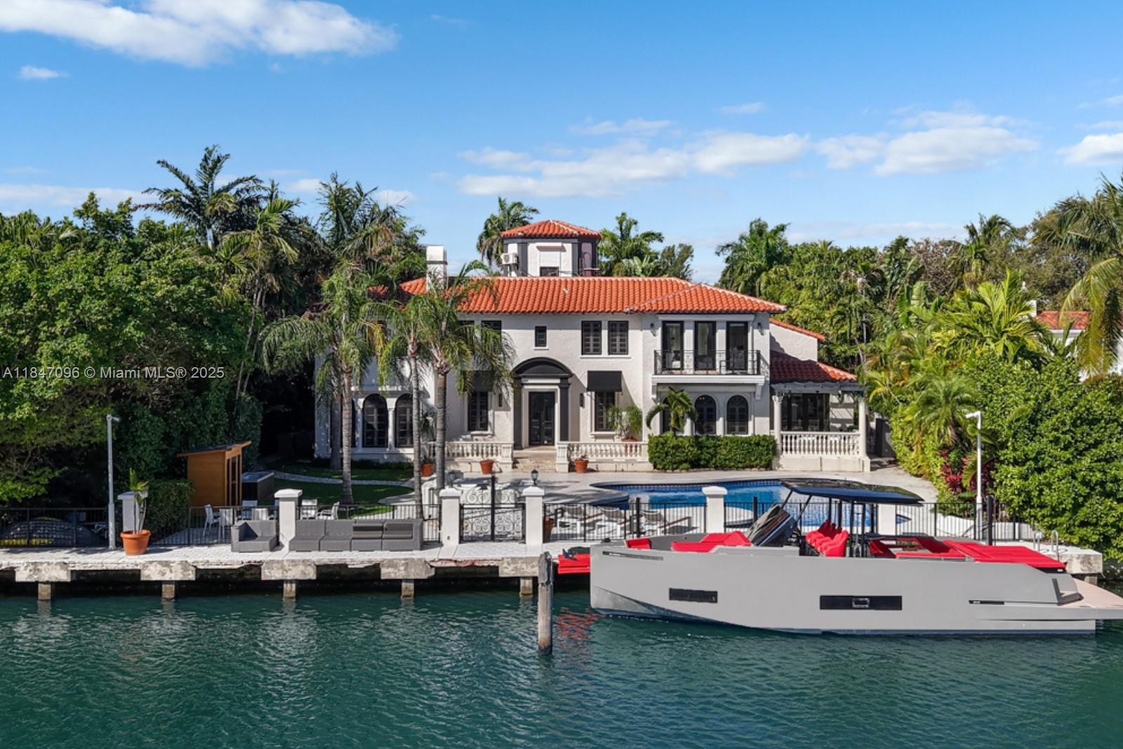 Elegant 7-bed, 6.5-bath Spanish Colonial waterfront estate on Flamingo Drive available for lease. This beautifully updated home blends timeless architecture with modern comforts, featuring Italian marble floors, a grand living room with fireplace, a sunlit family room, and a chef’s kitchen designed for entertaining. The spacious primary suite offers a private balcony, spa-style bath, and large walk-in closet. Enjoy tranquil water views, a deep pool, cold plunge, dry sauna, gym, and 100 feet of waterfront with a private dock. Ideally located near top schools, beaches, and houses of worship.