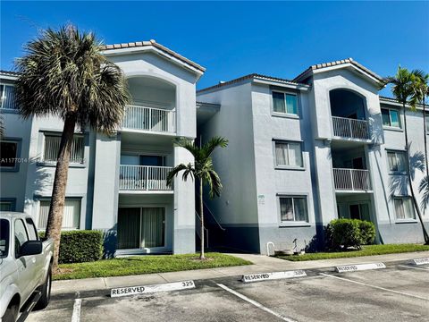 Photo of 2640 S University Dr #113, Davie, FL 33328 (MLS # A11770141)