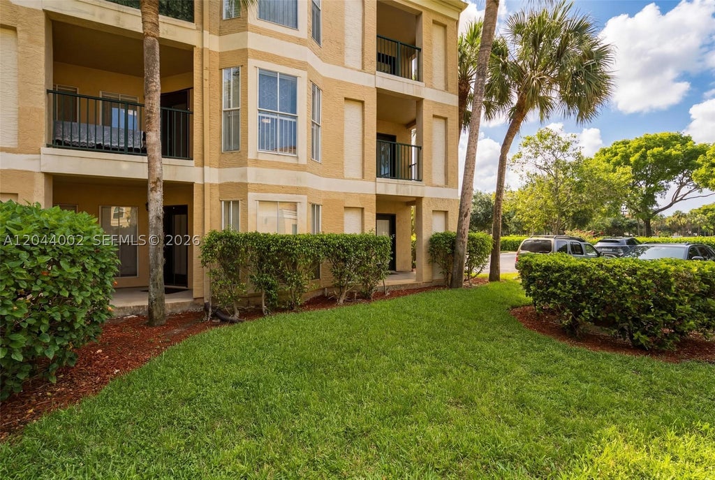 Photo of 977 Riverside Dr #220, Coral Springs, FL 33071 (MLS # A12044002)