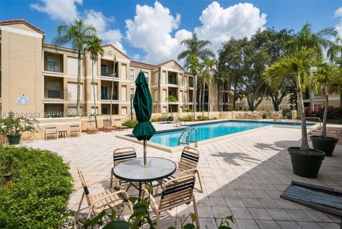 Photo of 977 Riverside Dr #220, Coral Springs, FL 33071 (MLS # A12044002)