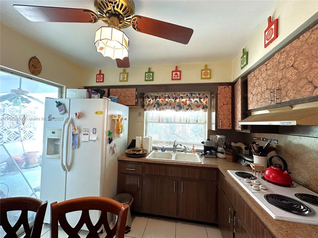 Photo of 2431 Sabal Palm Dr, Miramar, FL 33023 (MLS # A11903833)