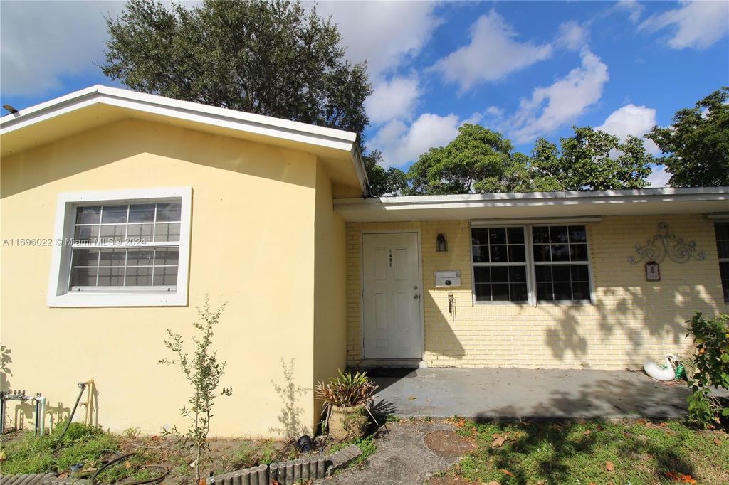 Photo of 5401 NW 16th Ct, Lauderhill, FL 33313 (MLS # A11696022)