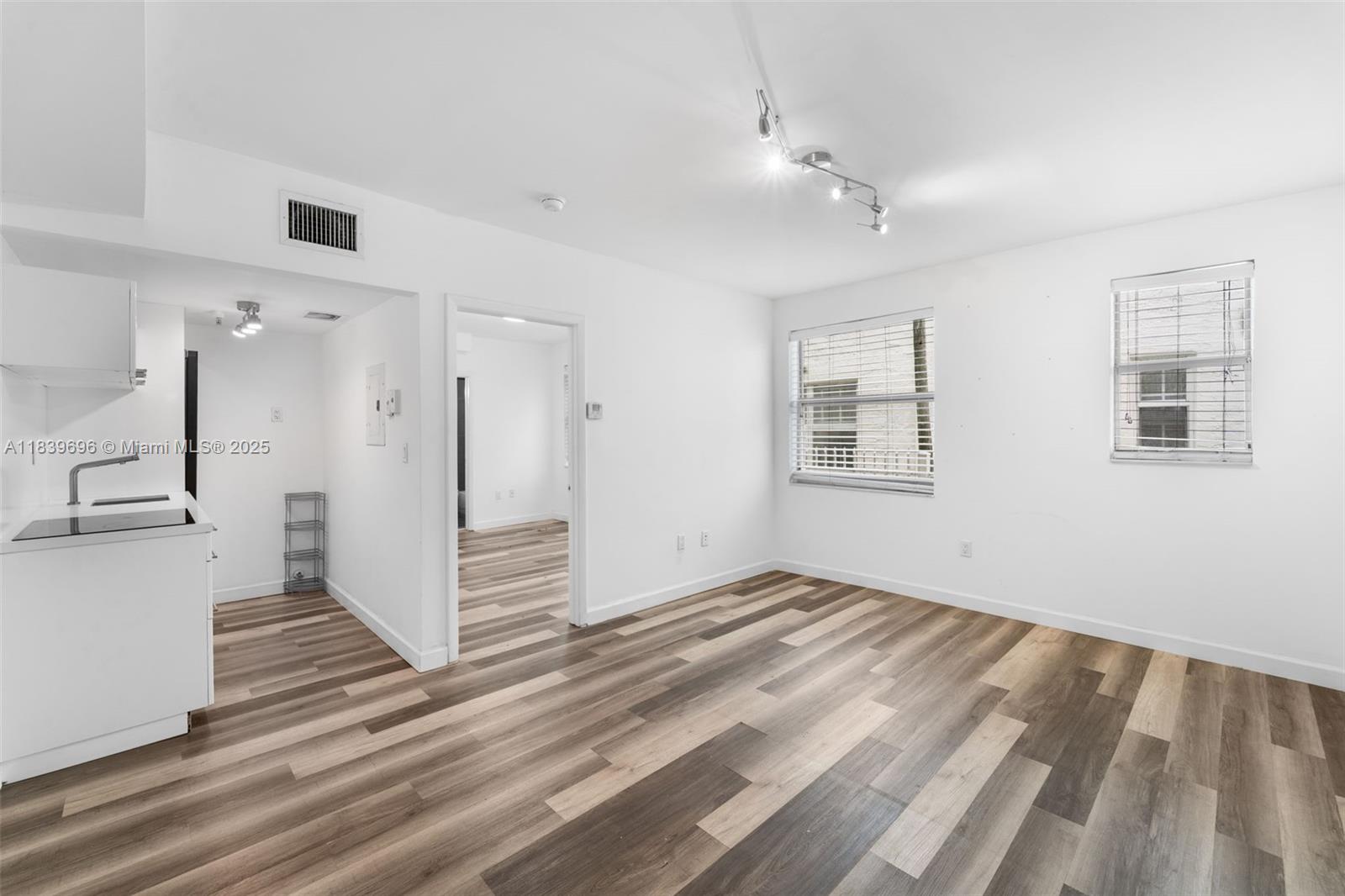 Upgraded unit in a boutique 16-unit Art Deco building just steps from Lincoln Road, Española Way, and the beach! This 1 bed, 1 bath first-floor condo features sleek white kitchen cabinets, wood laminate floors, stainless steel appliances, induction cooktop, updated bathroom and a spacious walk-in closet. Stay cool with central A/C or explore outside on the beautifully manicured grounds and unbeatable walkability to dining, shopping, nightlife, and Ocean Drive. Pet-friendly and rentable with a 3-month minimum—ideal as a pied-à -terre or investment property . HOA $506/month includes insurance, water & trash. Priced to sell fast!
