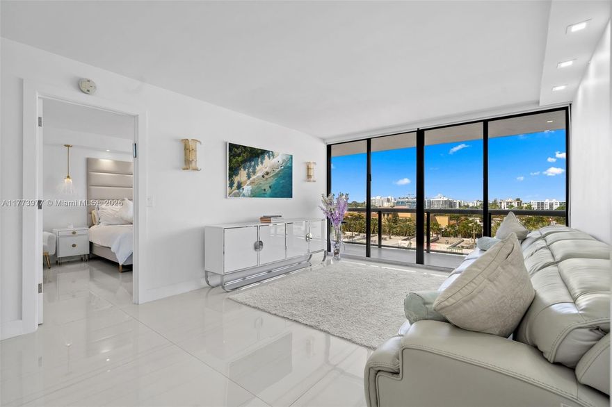 Stunning 2-Bed, 2-Bath residence at The Wave, one of Surfside’s most sought-after oceanfront buildings. This fully remodeled unit has over $250K in upgrades, blending modern sophistication with timeless luxury. Open-concept living area adorned with custom finishes, designer lighting, and premium flooring. The kitchen features top-of-the-line appliances, imported cabinetry, and quartz countertops. Spa-inspired bathrooms offering sleek vanities and designer tile work, creating a serene retreat. Breathtaking city views from the balcony, where floor-to-ceiling windows flood the space with natural light. Enjoy resort-style living with direct beach access, beach services, a heated pool, fitness center, 24-hour concierge, valet, and more. Minutes from Bal Harbour Shops, fine dining, & nightlife.