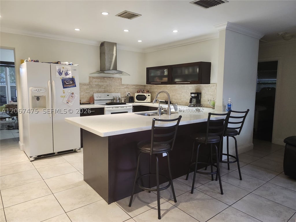 Photo of 6570 Thomas St #-, Hollywood, FL 33024 (MLS # A12067475)