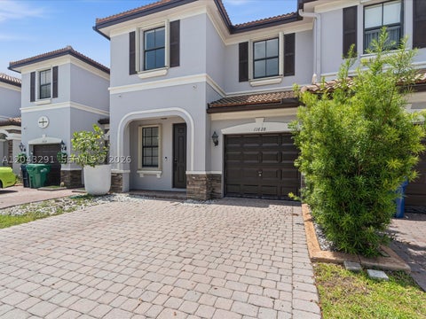 Photo of 11628 NW 87th Ln #11628, Doral, FL 33178 (MLS # A12043291)