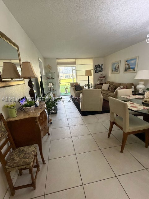 Photo of 8880 Sunrise Lakes Blvd #101, Sunrise, FL 33322 (MLS # A12104156)