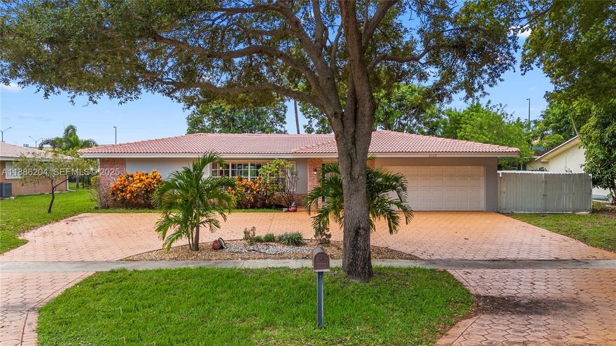 Enjoy the Florida lifestyle! Price to sell! Seller motivated! This beauty has everything you need! Let's start with the incredible curb appeal & circular driveway. Inside, 4 bedrooms, 2 bathrooms, plus a family room. The bedrooms are generously sized, and the inviting kitchen has wood cabinets, granite countertops, & SS appliances. The two cabana bathrooms make pool days a breeze. Step outside to the covered patio with a newer flat roof and screened pool area, perfect for cooling off, grilling out, or enjoying the relaxing view without back neighbors! There's a 2-car garage with an impact door & new motor, a laundry room, parking for your boat or trailer, & two stunning Mango trees! New Water Heater. A/C 2021. Located close to schools, parks, and with easy access to major highways. NO HOA. Vacant & ready for your personal touch! Must see!