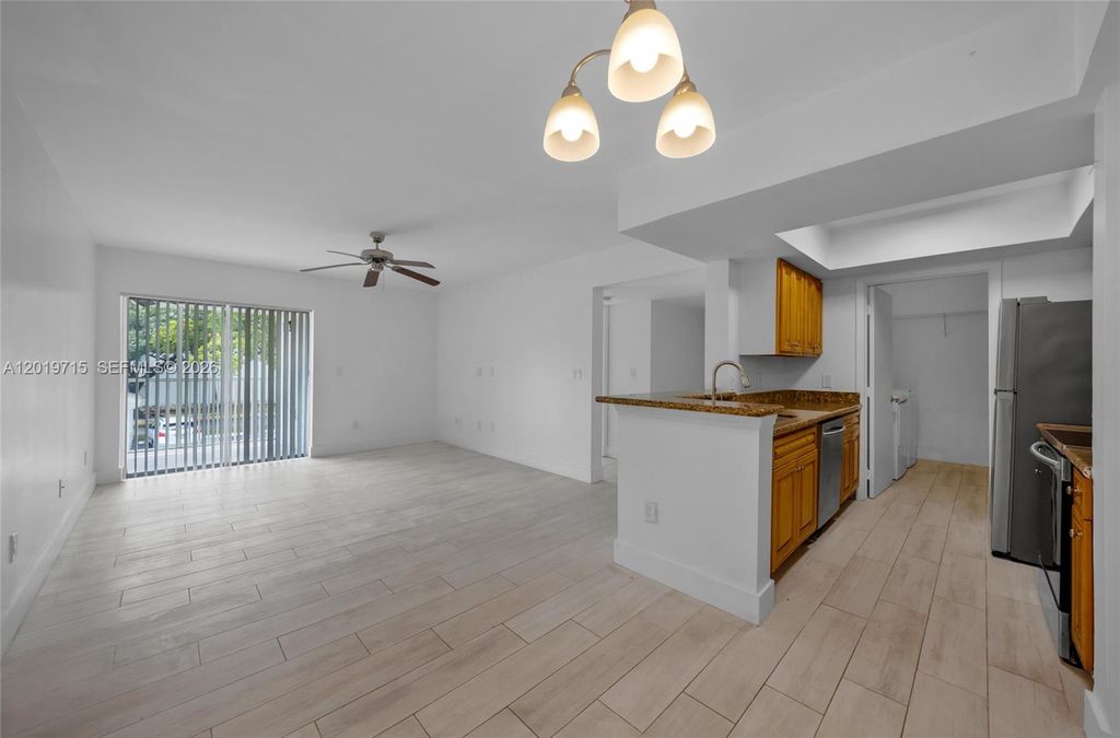 Photo of 5760 Rock Island Rd #321, Tamarac, FL 33319 (MLS # A12019715)