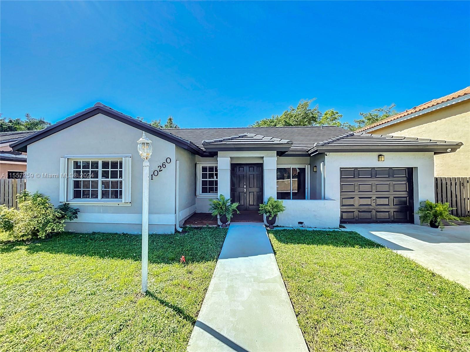 Welcome to this centrally located home in the heart of Kendall. This spacious home has 4 bedrooms and 2 bathrooms, including a generous master bedroom with a walk-in closet. The roof was recently updated, a one-car garage and a great covered outdoor patio ideal for gatherings. Conveniently located near top-rated schools such as Claude Pepper Elementary and just a short 4-mile drive from MDCC and its proximity to the turnpike and major highways makes commuting a breeze.  For outdoor enthusiasts, nearby Sugarwood Park awaits with its public workout zone and expansive Hammock Trails. Don't miss out on the chance to make this centrally located home your own.