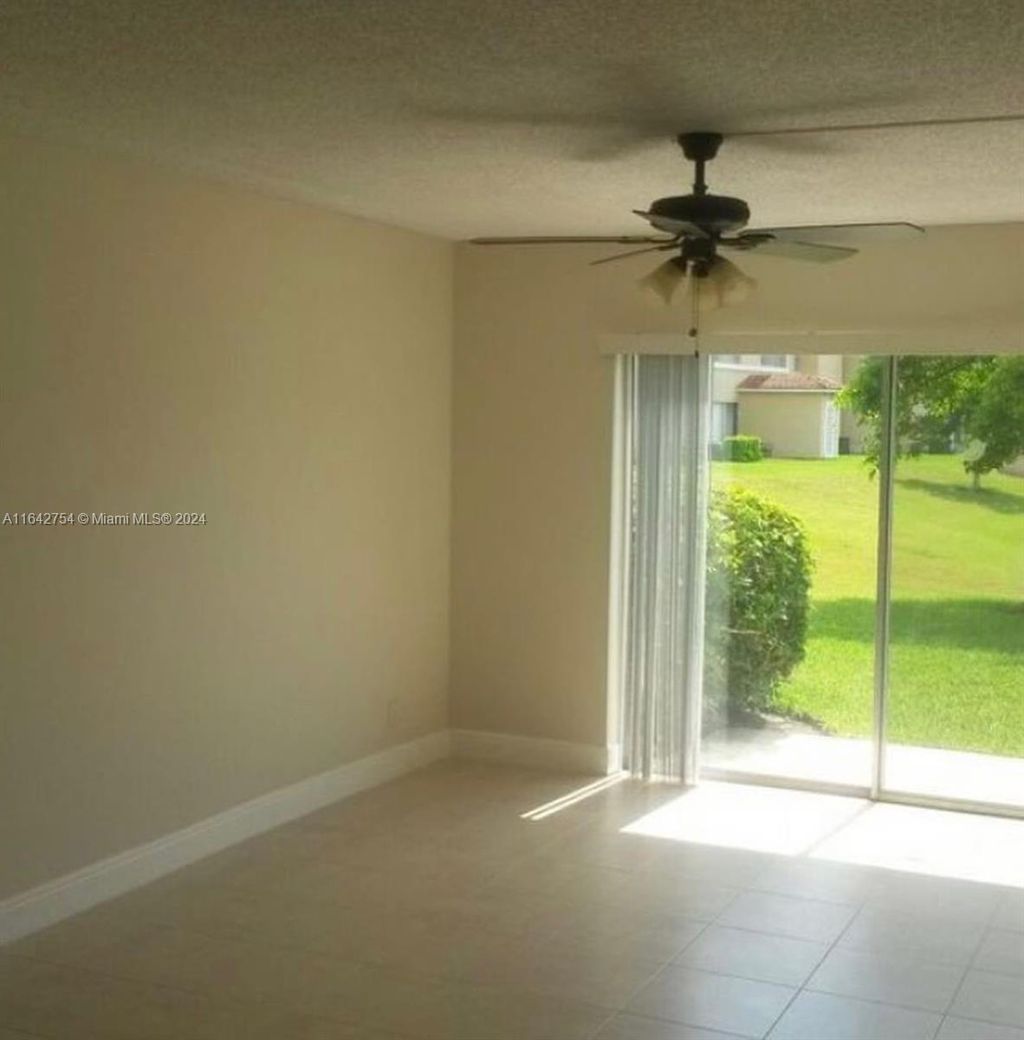 Photo of 925 Twin Lakes Dr #3-B, Coral Springs, FL 33071 (MLS # A11642754)