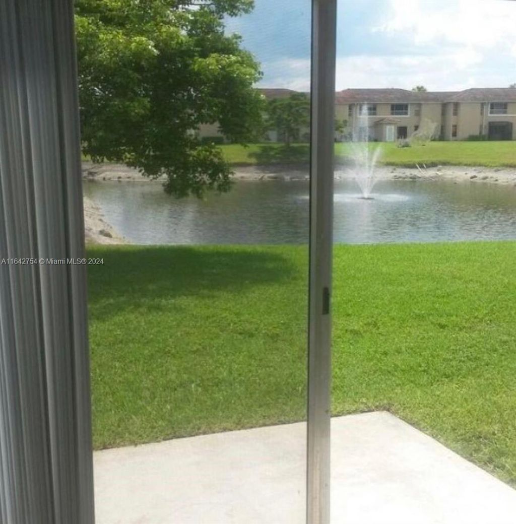 Photo of 925 Twin Lakes Dr #3-B, Coral Springs, FL 33071 (MLS # A11642754)