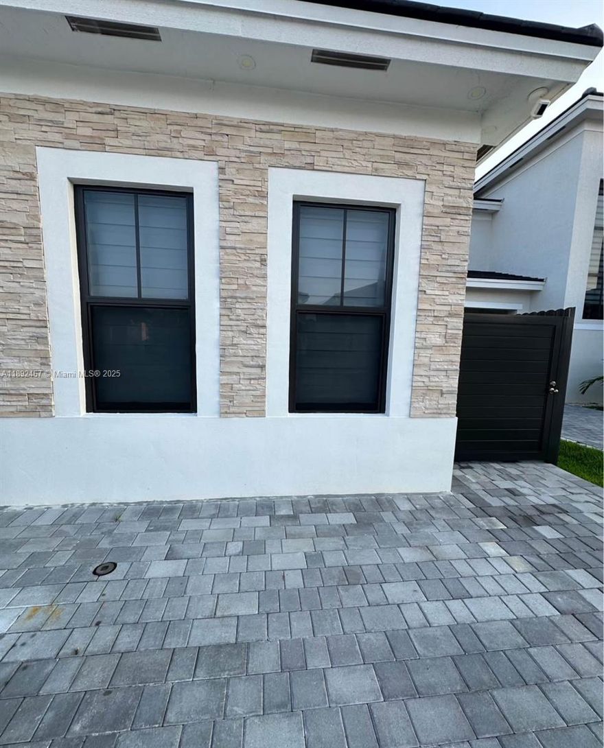 Brand new one-bedroom, one-bathroom apartment featuring a kitchenette, a private patio, and two dedicated parking spots, all nestled in a beautiful Miami neighborhood