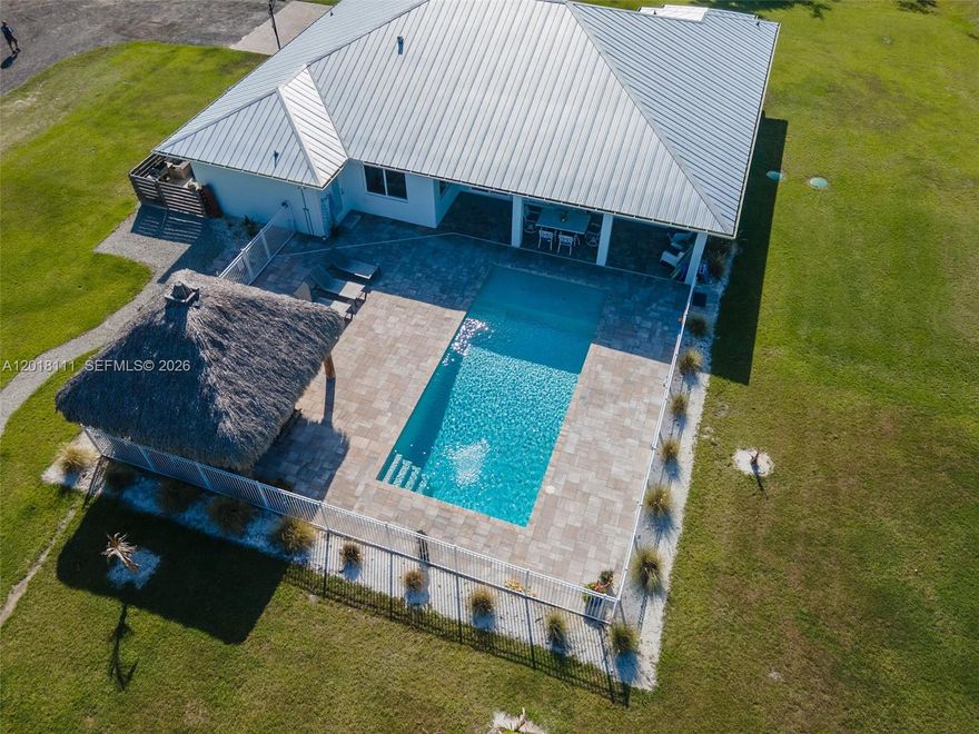 Beautiful and unique almost new home on 4.1 acres in St. Lucie County minutes from shopping ,beaches and I-95 ,this home features three bedrooms three baths and a two car garage huge open floor plan, covered patios, beautiful pool ,tiki bar and fire pit. There is no HOA so fewer restrictions , bring your boat RV or your animals as it is​​‌​​​​‌​‌​​​‌‌​​​‌‌‌​​‌​​‌‌​​​​ AR-1.