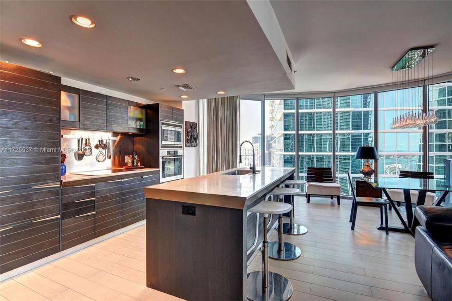Experience luxury and urban living at EPIC Miami!  Residence offers breathtaking views of Biscayne Bay.  Floor-to-ceiling windows allow to bring in natural light, with spacious balconies and a gourmet kitchen with top-of-the-line appliances.  Residents can enjoy wonderful amenities, including 3 pools, a spa, fitness center, waterfront restaurant, marina access, 24/7 concierge services, and access to the Kimpton Hotel's facilities. Great location near Downtown Miami and Brickell, this is an exceptional opportunity. Schedule your private showing today!