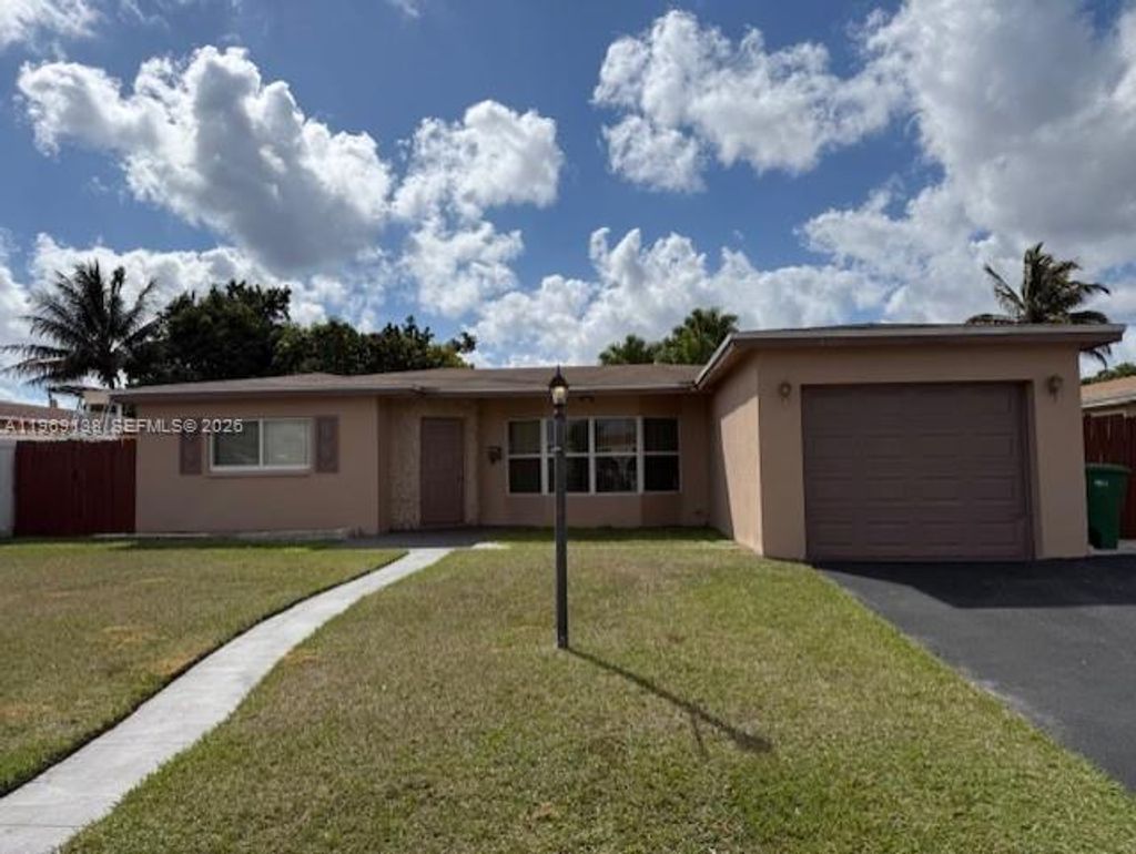 Photo of 4460 NW 43rd St, Lauderdale Lakes, FL 33319 (MLS # A11969138)
