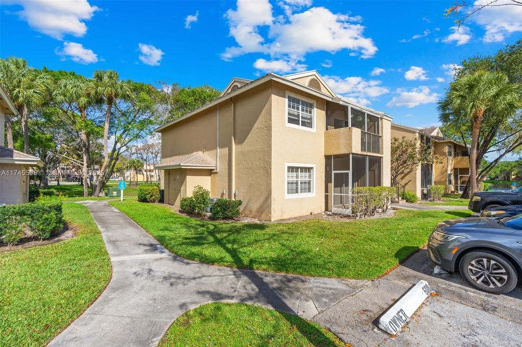 Photo of 661 Cypress Lake Blvd #H20, Deerfield Beach, FL 33064 (MLS # A11745598)