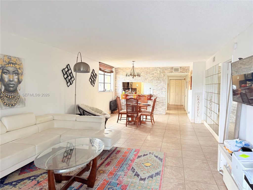 Photo of 6575 W Oakland Park Blvd #311, Lauderhill, FL 33313 (MLS # A11994629)