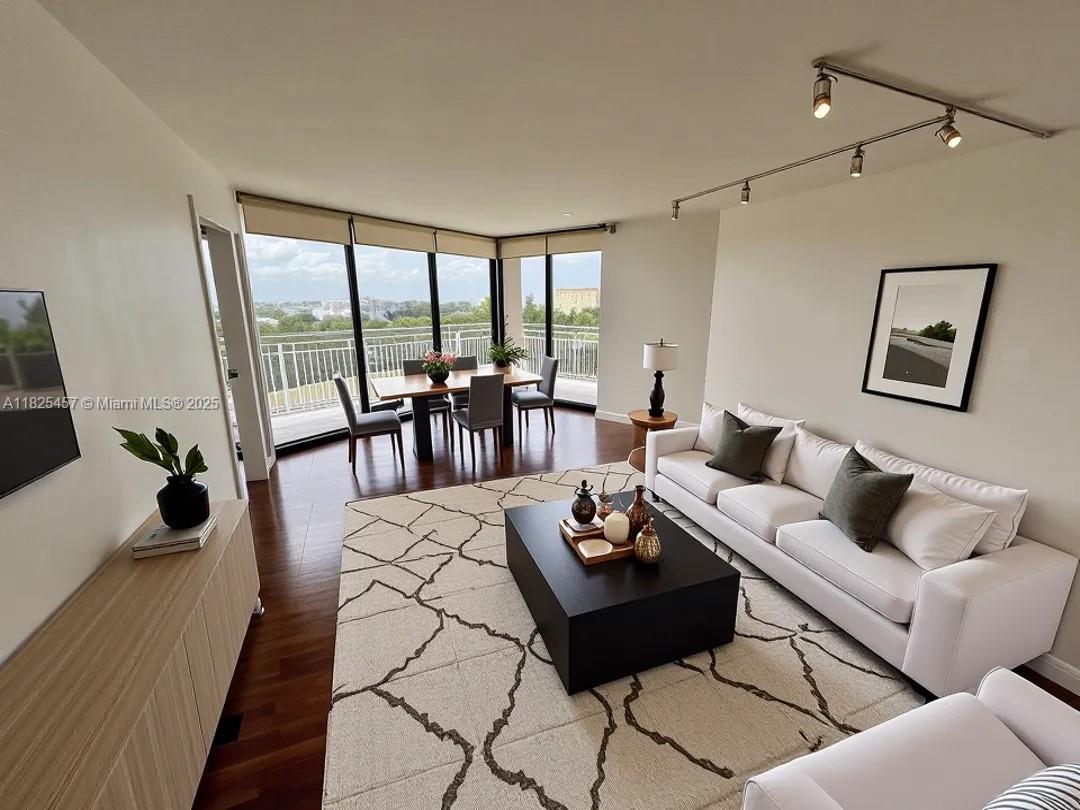 Renovated 2/2 unit w/ lots of windows and light. Open and updated kitchen with new appliances. Overlooks Biscayne bay and lush gardens with multiple fountains. See the Sunrise and Sunset from this unique and spacious unit. Panoramic views from every window! This is not just a building, this is a Tennis and Marina Community with resort style amenities and includes two restaurants on site with outdoor dining on the Marina, a very active Tennis facility, spa, gym, playground are just a few of the amenities. This property has over 34 acres of gated trees and foliage to enjoy while you roam, walk and run safely. Enjoy the Quayside's resort lifestyle completed with 24 hour security within a moments notice. A must see and Easy to Show!