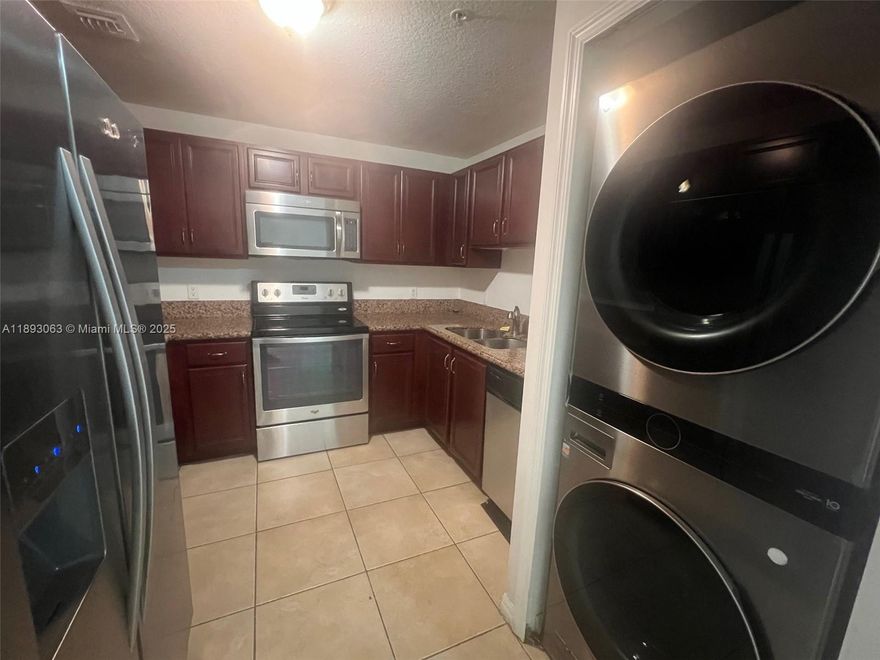 GREAT LOCATION !! 2 BEDROOMS 2 BATHS SPLIT PLAN UNIT + DEN/OFFICE. TILE FLOORS THROUGH OUT, GRANITE COUNTER TOPS, STAINLESS STEEL APPLIANCES , LARGE STACKABLE SS WASHER AND DRYER. (2)  PARKING SPACES . VISITORS AND STREET PARKING. STEPS TO CORAL GABLES, MINUTES TO MIAMI INTERNATIONAL AIRPORT, RESTAURANS, 836 AND 826. WELL MAINTAIN SECURED BUILDING. MOVE IN WITH $5,400.00 (FIRST MONTH $2,350.00 AND SECURITY DEPOSIT OF $3,000.00) (NO LAST MONTH). EASY TO SHOW!