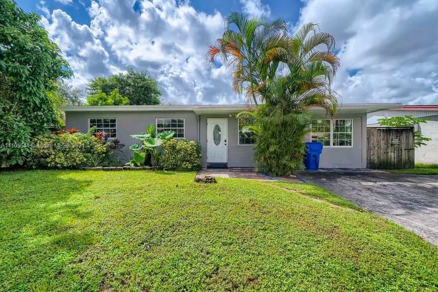 Prepare yourself to be impressed as you enter this well-maintained 4 bedroom and 2 bathroom home located in Hollywood Florida!  With sleek interior finishes and large rooms, this home looks and feels like a private retreat. As you enter the home, you are greeted by an open concept living room and kitchen.  You will fall in love with the kitchen, with attractive cabinets and a breakfast bar. The primary bedroom features a sizable closet and a recently updated ensuite bathroom. Get ready to relax in your large, verdant backyard with a large inground pool. This yard is ready for entertaining. This home is located near major roads, beaches, shopping, eateries, parks, and schools. Do not miss seeing this impressive home!