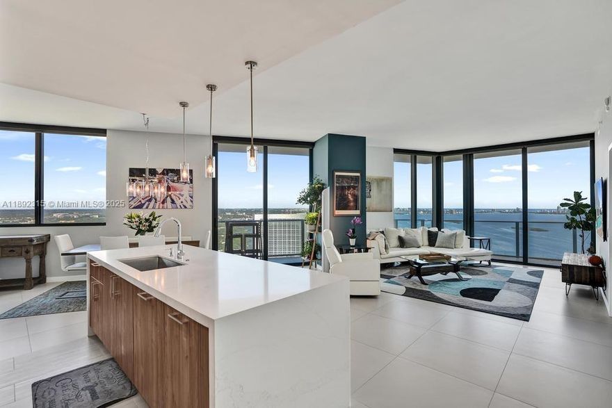 Experience elevated living at Paraiso Bayviews in this stunning 4-bedroom, 4.5-bath penthouse residence offering over 2,500 sq ft of modern luxury. Enjoy unobstructed panoramic views of the Intracoastal, Biscayne Bay, and Miami skyline from floor-to-ceiling windows and a spacious wraparound terrace where you can watch both sunrise and sunset. Bright open layout, sleek contemporary kitchen, and en-suite bedrooms throughout. Resort-style amenities include a rooftop pool with breathtaking views, gym, spa, tennis.  Best-priced 4-bedroom penthouse in Edgewater, a rare opportunity to own one of Miami’s most desirable sky homes.