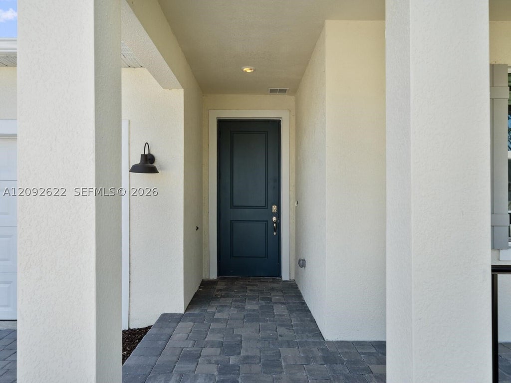 Photo of 6712 NW Cloverdale Ave #6712, Port St Lucie, FL 34987 (MLS # A12092622)