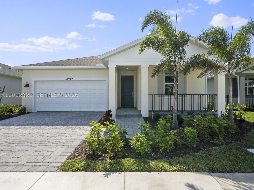 Photo of 6712 NW Cloverdale Ave #6712, Port St Lucie, FL 34987 (MLS # A12092622)