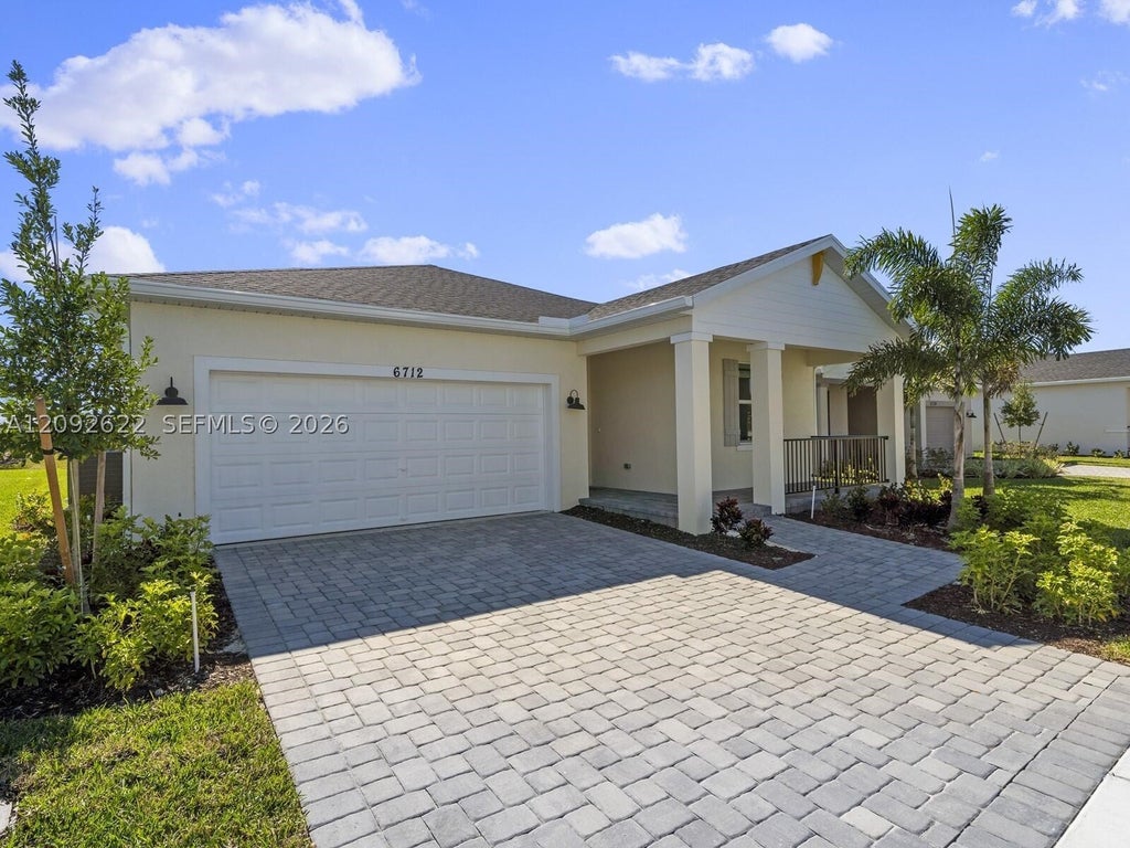 Photo of 6712 NW Cloverdale Ave #6712, Port St Lucie, FL 34987 (MLS # A12092622)