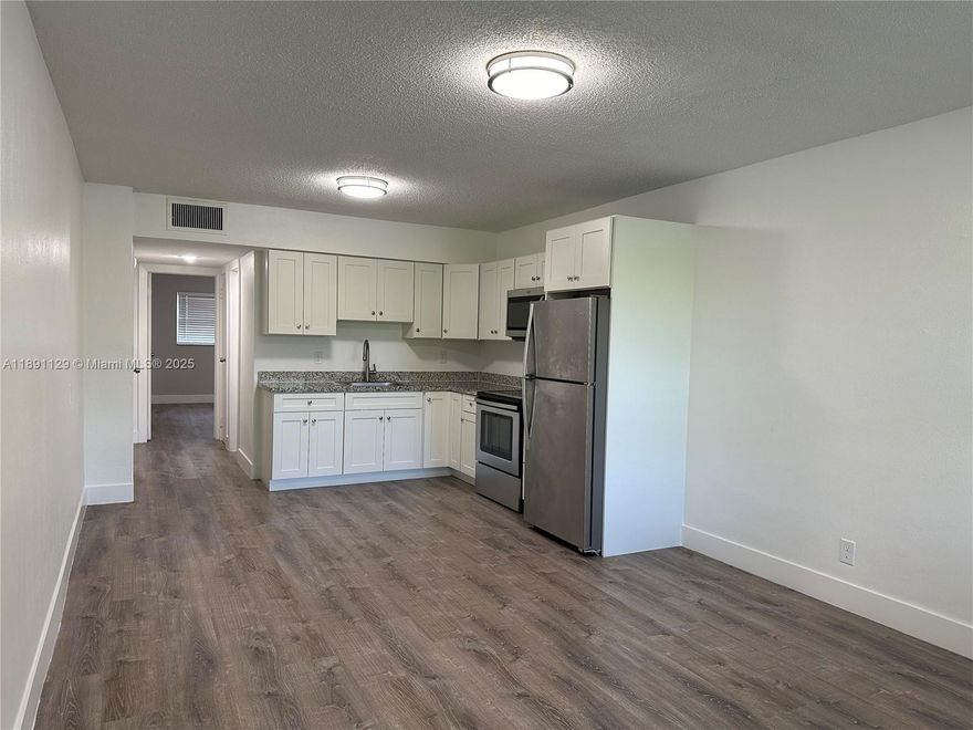 BRAND NEW, 1-BEDROOM/1-BATH APARTMENT IN BEAUTIFUL COMPLEX - GREAT NEIGHBORHOOD AND CENTRALLY LOCATED IN HOLLYWOOD! This spacious unit features new flooring, new lighting + kitchen and bathroom upgrades. Fully remodeled, second floor unit in a peaceful, well-maintained building. Also includes central AC and 1 assigned parking space. Laundry is onsite. Water, waste, sewer included in rent as well as pest control and maintenance. Pets welcome with small non-refundable pet deposit. Property is tucked away on a cute, quiet street but also walking distance to shops, restaurants, and close to Downtown Hollywood, Art Walk, Hollywood Beach Golf Club, Young Circle Park, Major highways such as A1A, US1, I-95 etc. Highly desirable area - < 10 mins from Hollywood Beach. Great parks and schools nearby!