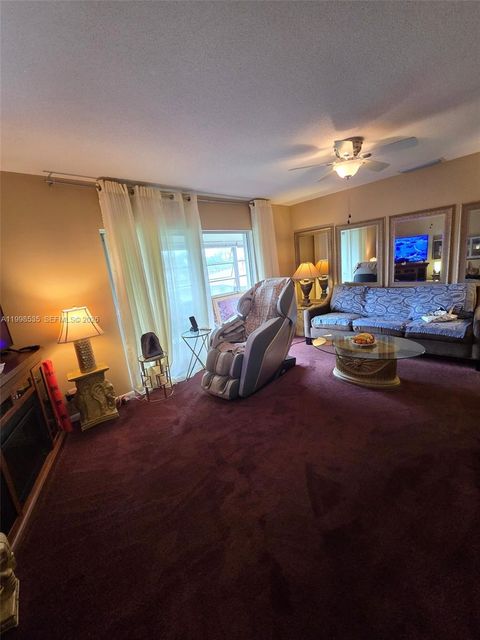 Photo of 410 NE 17th Ave #203, Boynton Beach, FL 33435 (MLS # A11998535)