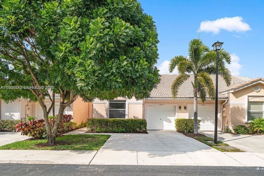 Photo of 2437 S Coral Trace Cir #2437, Delray Beach, FL 33445 (MLS # A11935543)