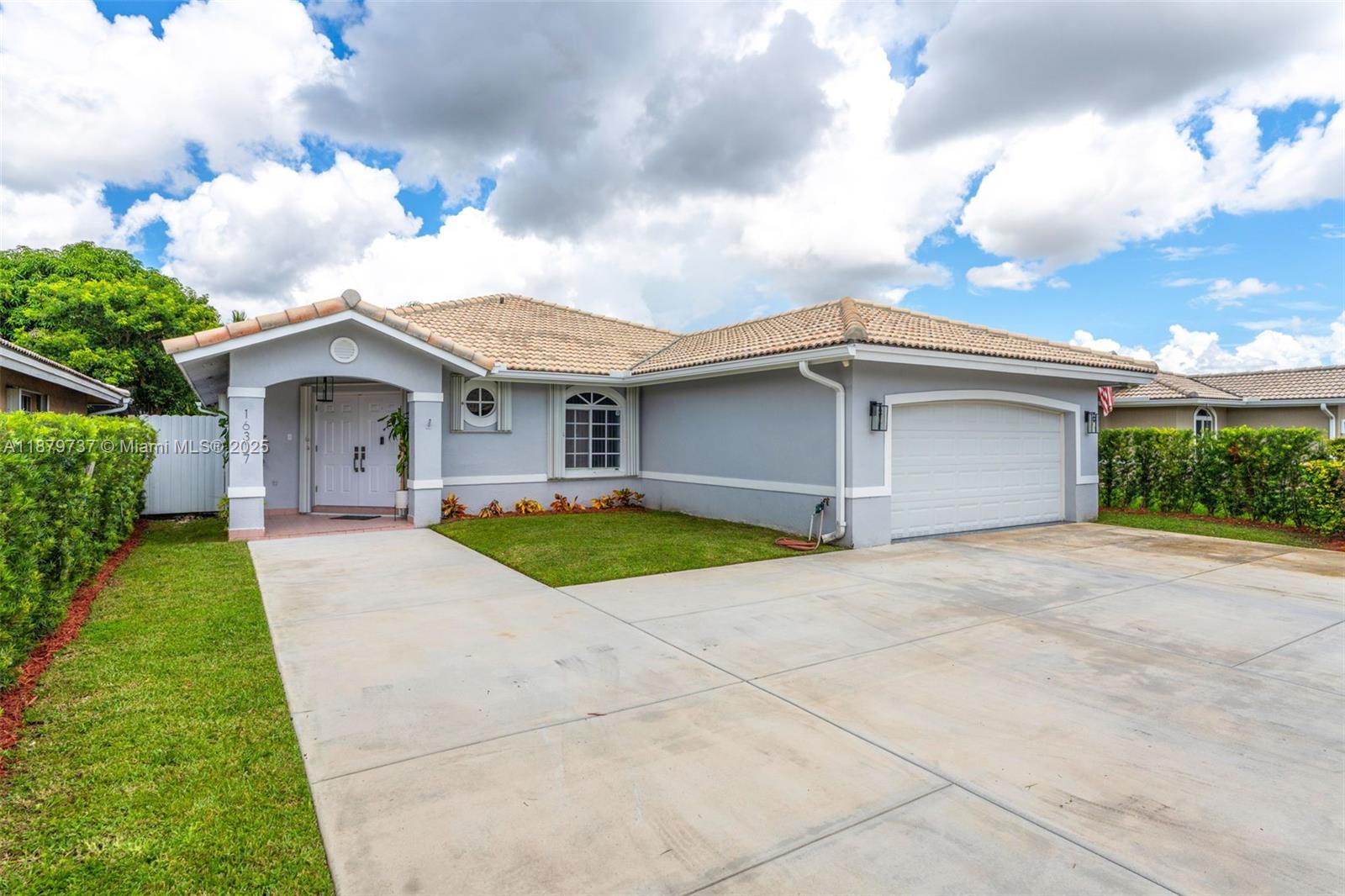 Excellent location in a desirable neighborhood. This is a single-story house in a gated community on a 5,500-square-foot lot. It has high ceilings, four bedrooms, and two bathrooms. There is a spacious living and dining area. The kitchen is at the back of the house for greater privacy, overlooking a spacious family room, where there is access to a large, widepatio, fully covered and fenced, for family enjoyment. The house has a double garage and an additional paved outdoor area for additional parking for family and visitors. It is close to schools, stores, restaurants and hospitals. It has a very good market price and is ready for you.