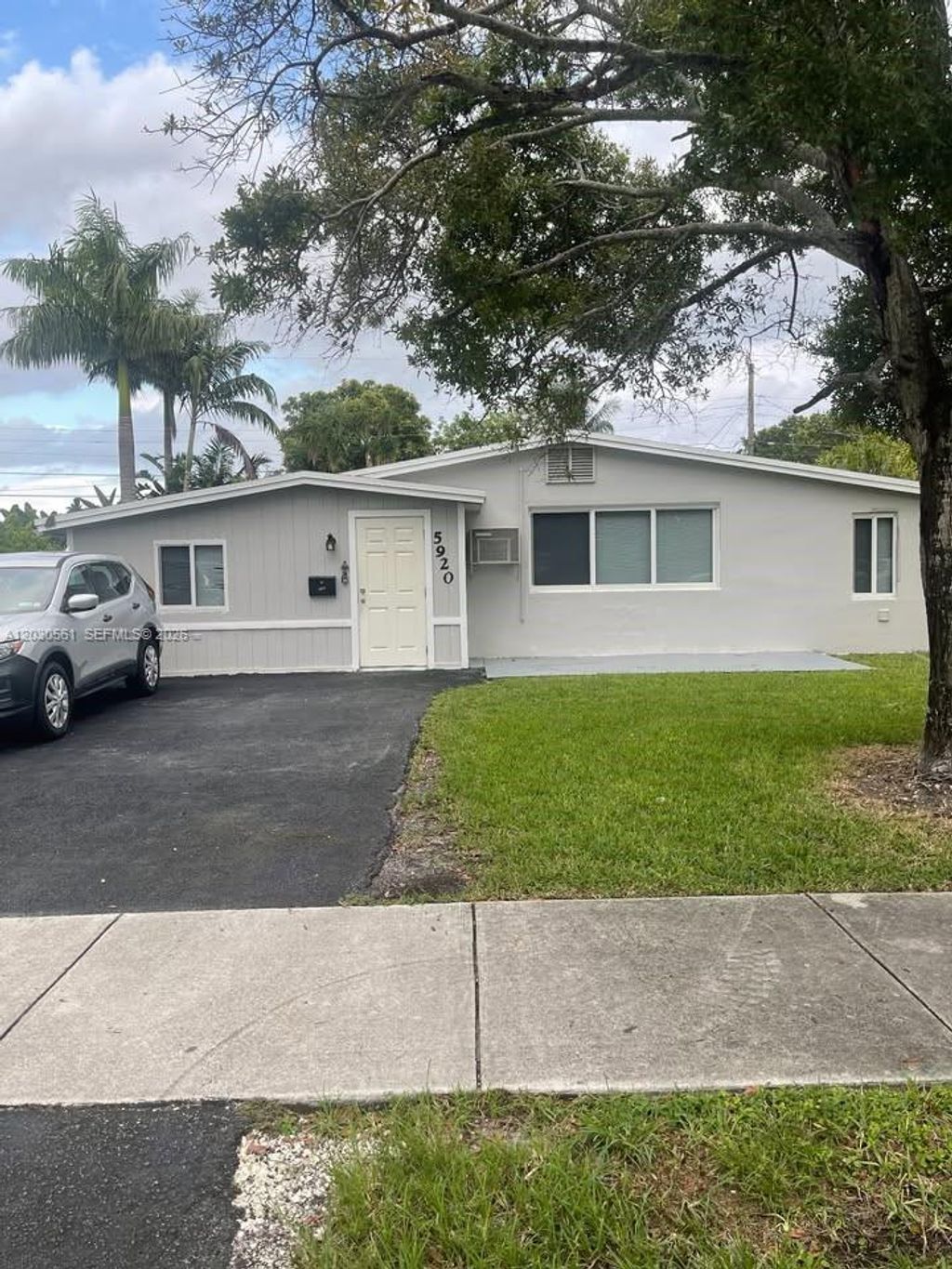 Photo of 5920 NE 1st Ter, Oakland Park, FL 33334 (MLS # A12030561)