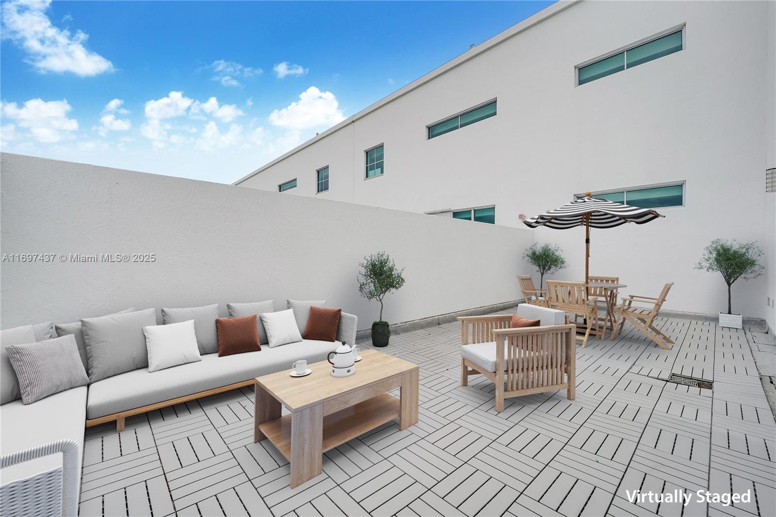 Located in the coveted South of fifth neighborhood, this spacious 1 bed+den/1.5 bath unit features an expansive private terrace as well as a covered balcony, offering over 1200 sf of indoor and outdoor living. Features include an open kitchen to the living room, granite counters, Italian fixtures, SS appliances, marble floors, one assigned garage parking space and a storage locker. The Cosmopolitan is a financially secure, full-service building with 24/7 security, heated pool w/jacuzzi, fitness center, & clubroom. Walk 2 blocks to the beach, fine dining, & South Pointe Park.